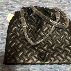 Elegant Black Quilted Leather Women's Bag. New with tags and dust bag.